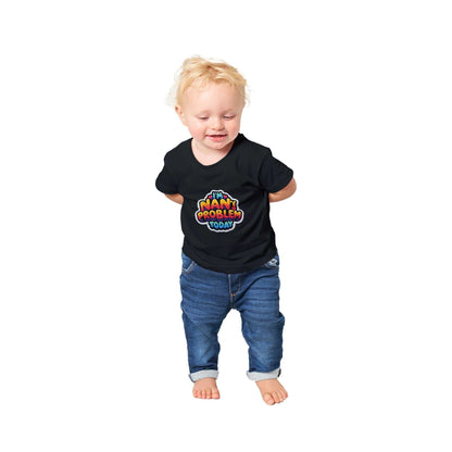 Baby wearing black "I'm Nan's Problem Today" crewneck t-shirt, smiling and standing.