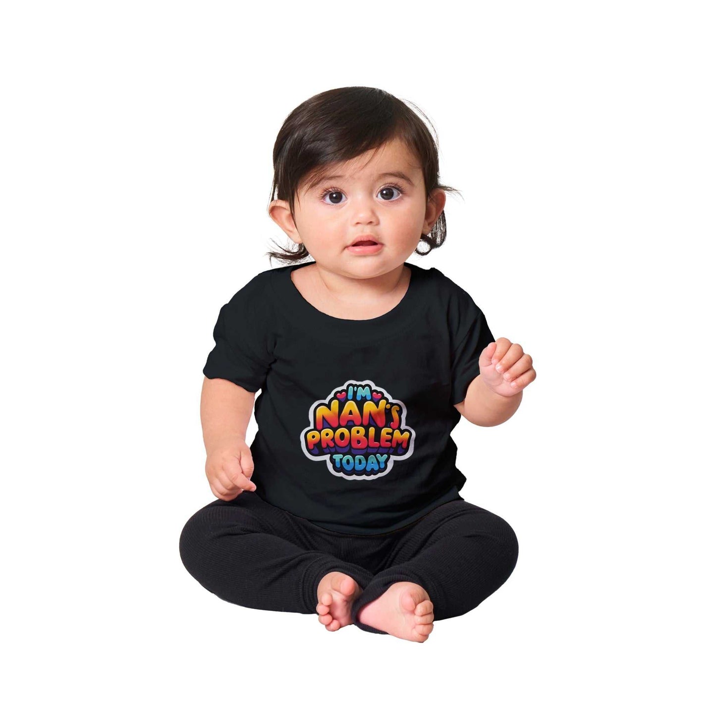 Baby wearing "I'm Nan's Problem Today" black crewneck t-shirt, 100% cotton, relaxed fit.