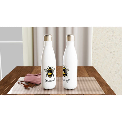 Tote Bag White 17oz Stainless Steel Water Bottle with bee design on table.