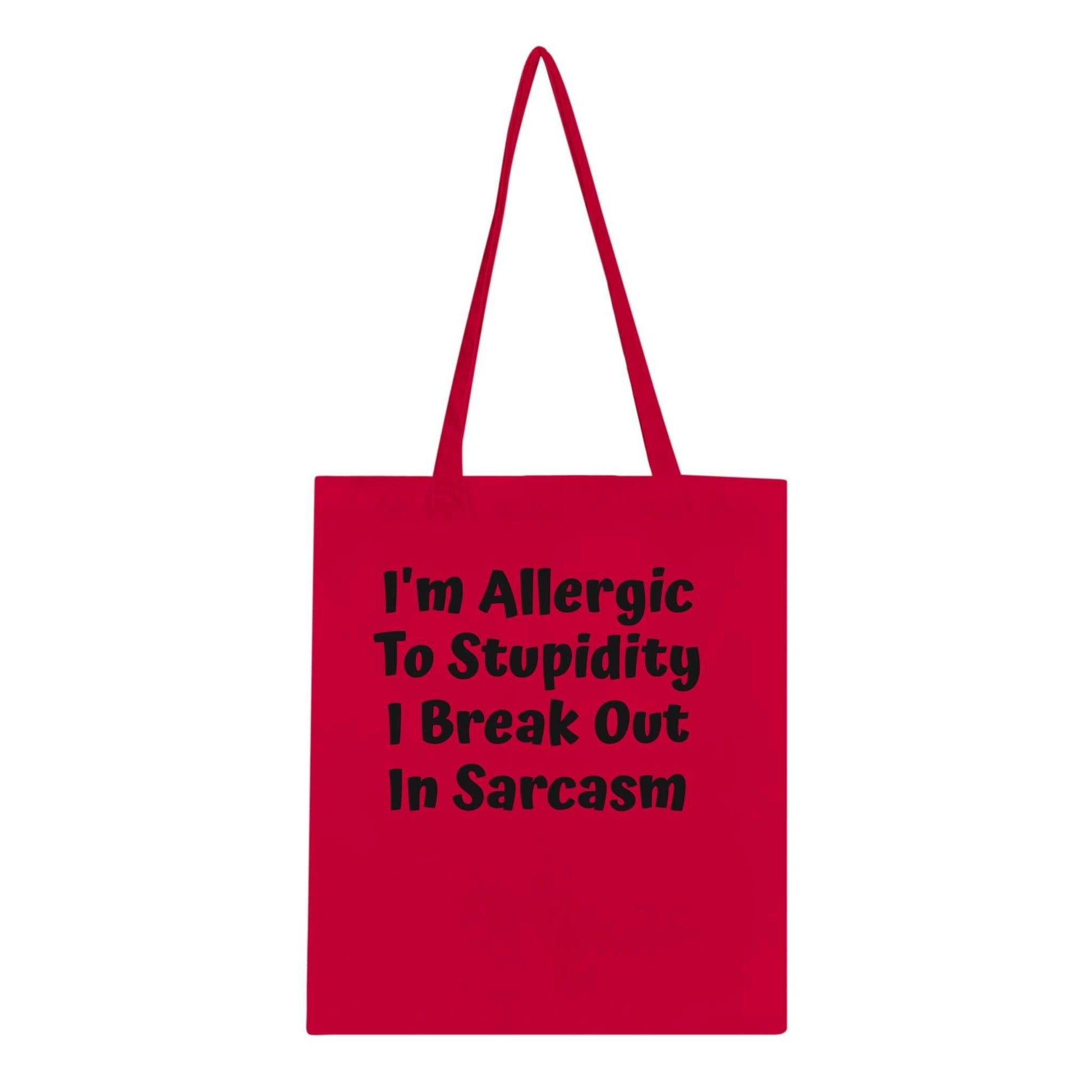 Red tote bag with "I'm Allergic To Stupidity, I Break Out In Sarcasm" text, eco-friendly cotton.