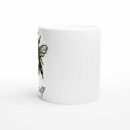 White 11oz ceramic mug with bee design, dishwasher and microwave safe.