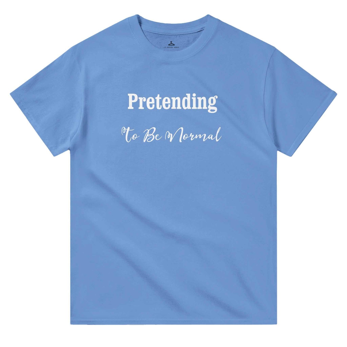 Blue crewneck tshirt with "Pretending To Be Normal" text, durable cotton fabric, classic fit for women.