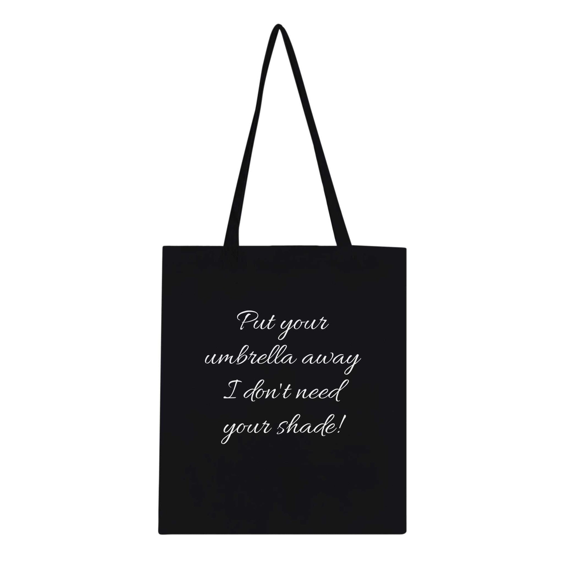 Eco-conscious classic tote bag with reinforced handles, featuring the phrase "Put Your Umbrella Away I Don't Need Your Shade!"