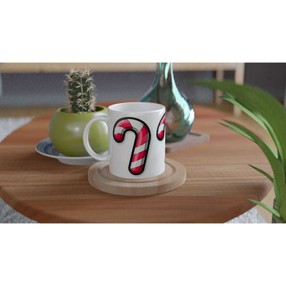 Candy Cane 11oz ceramic mug on a wooden table, featuring a vibrant candy cane design.