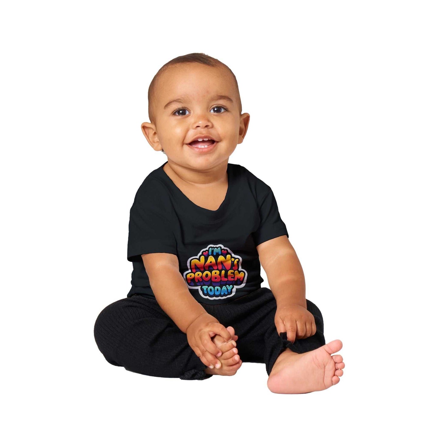 Baby wearing "I'm Nan's Problem Today" crewneck t-shirt, 100% cotton, black, relaxed fit, playful design.